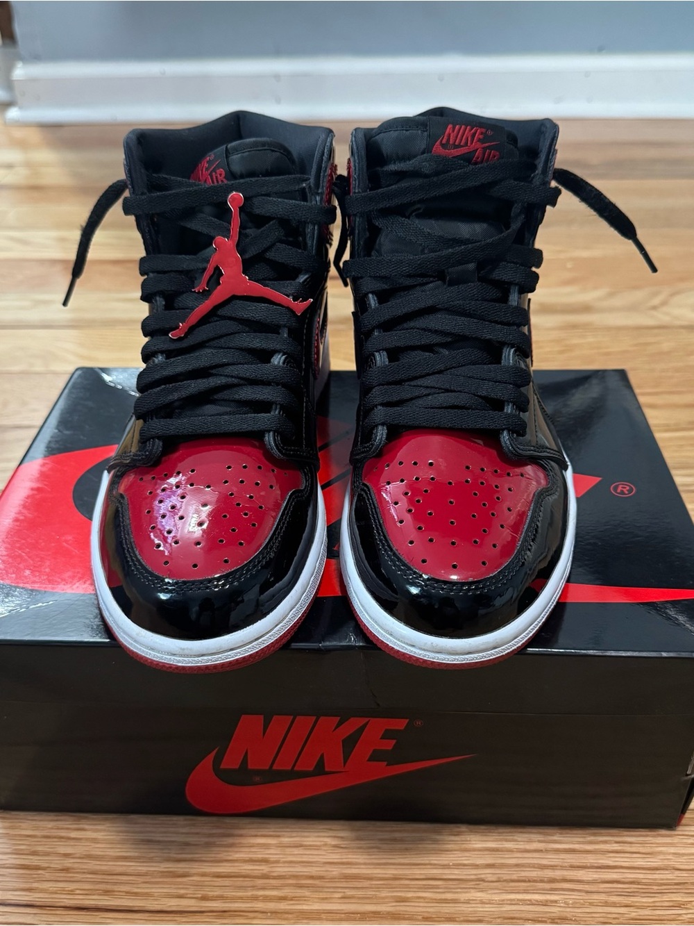 Nike Air Jordan 1 High-Top Sneakers in Black and Red